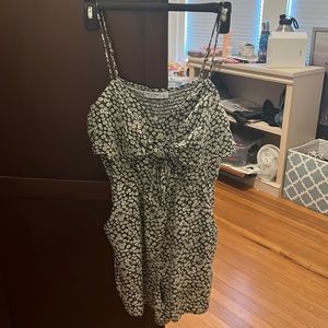 Green with white flowers romper